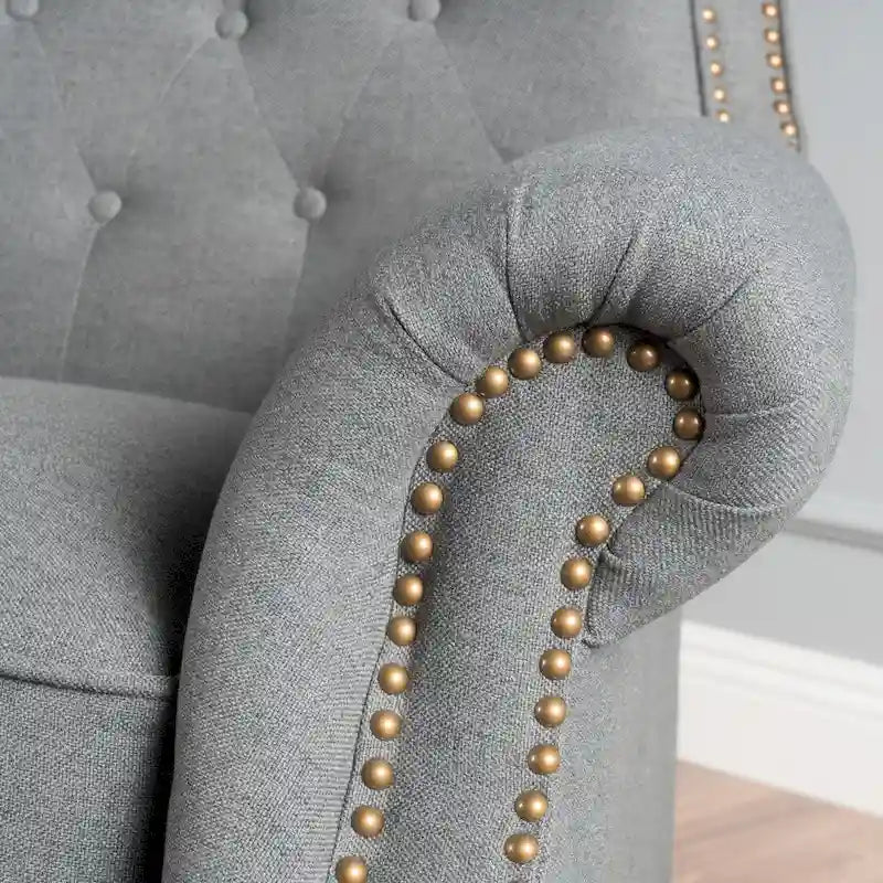 Fauteuil inclinable en tissu clouté par