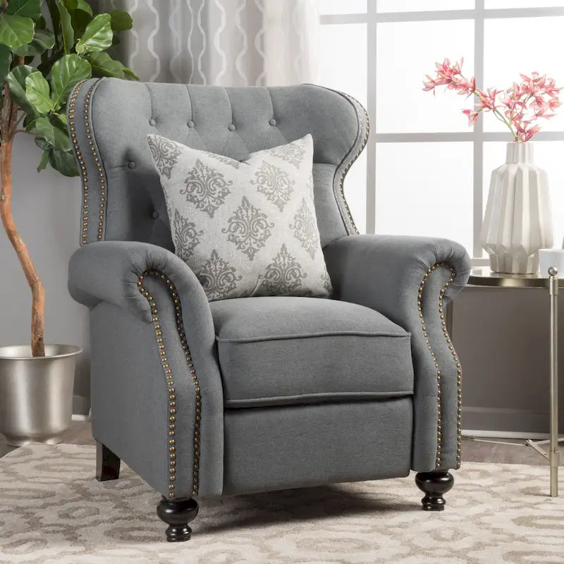 Fauteuil inclinable en tissu clouté par