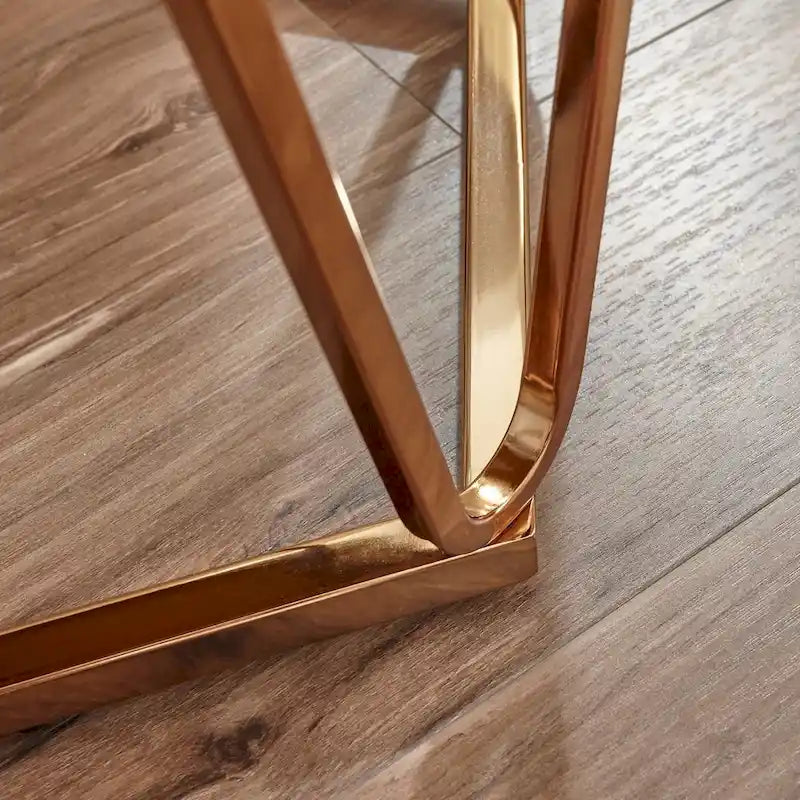 Table d'appoint ronde moderne en faux marbre avec base géométrique dorée